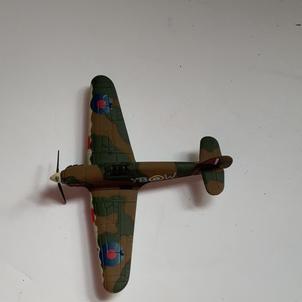 Corgi military camouflage die cast model plane.
